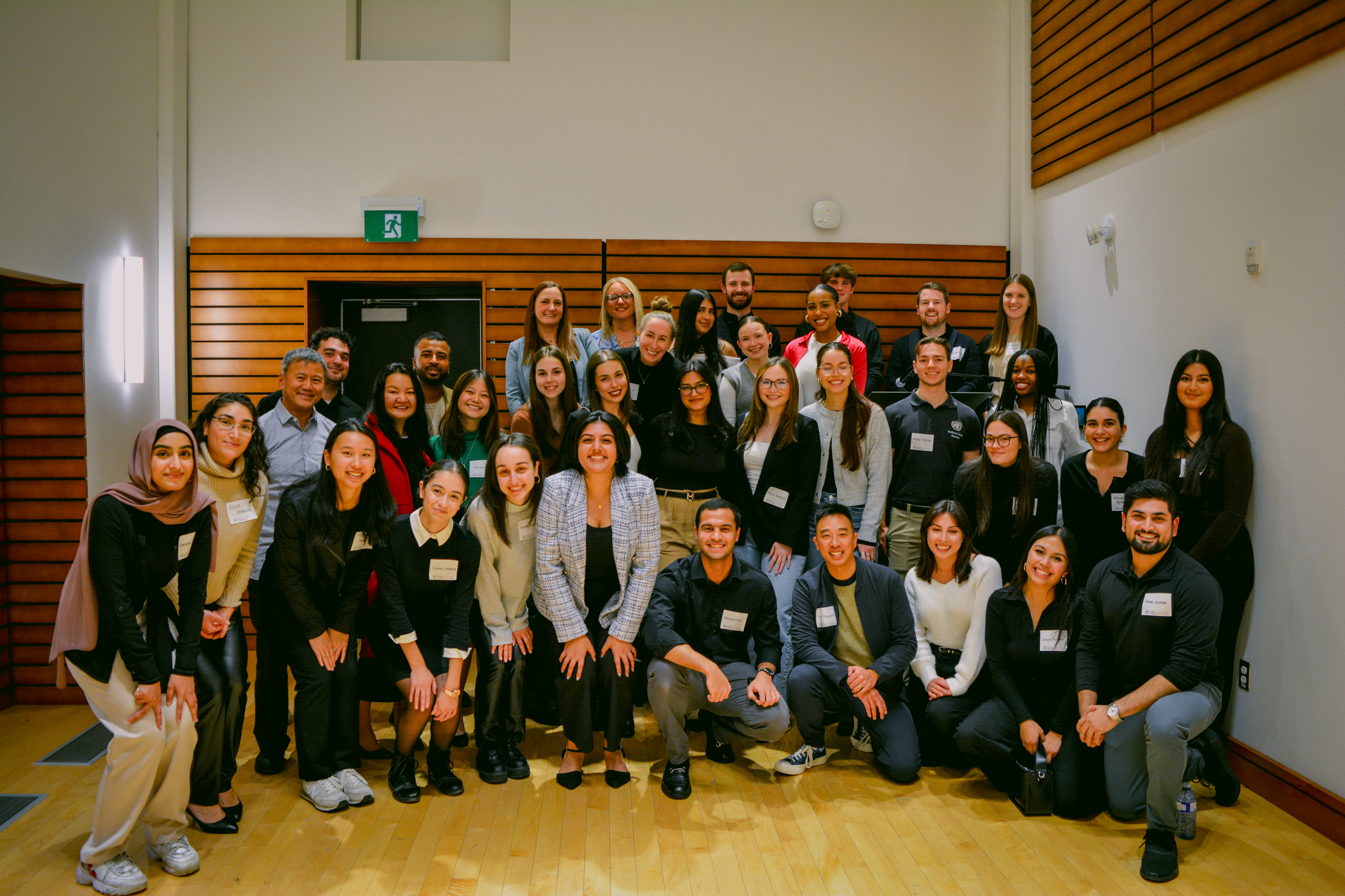 A large group of CASCO students and mentors pose for a photo.