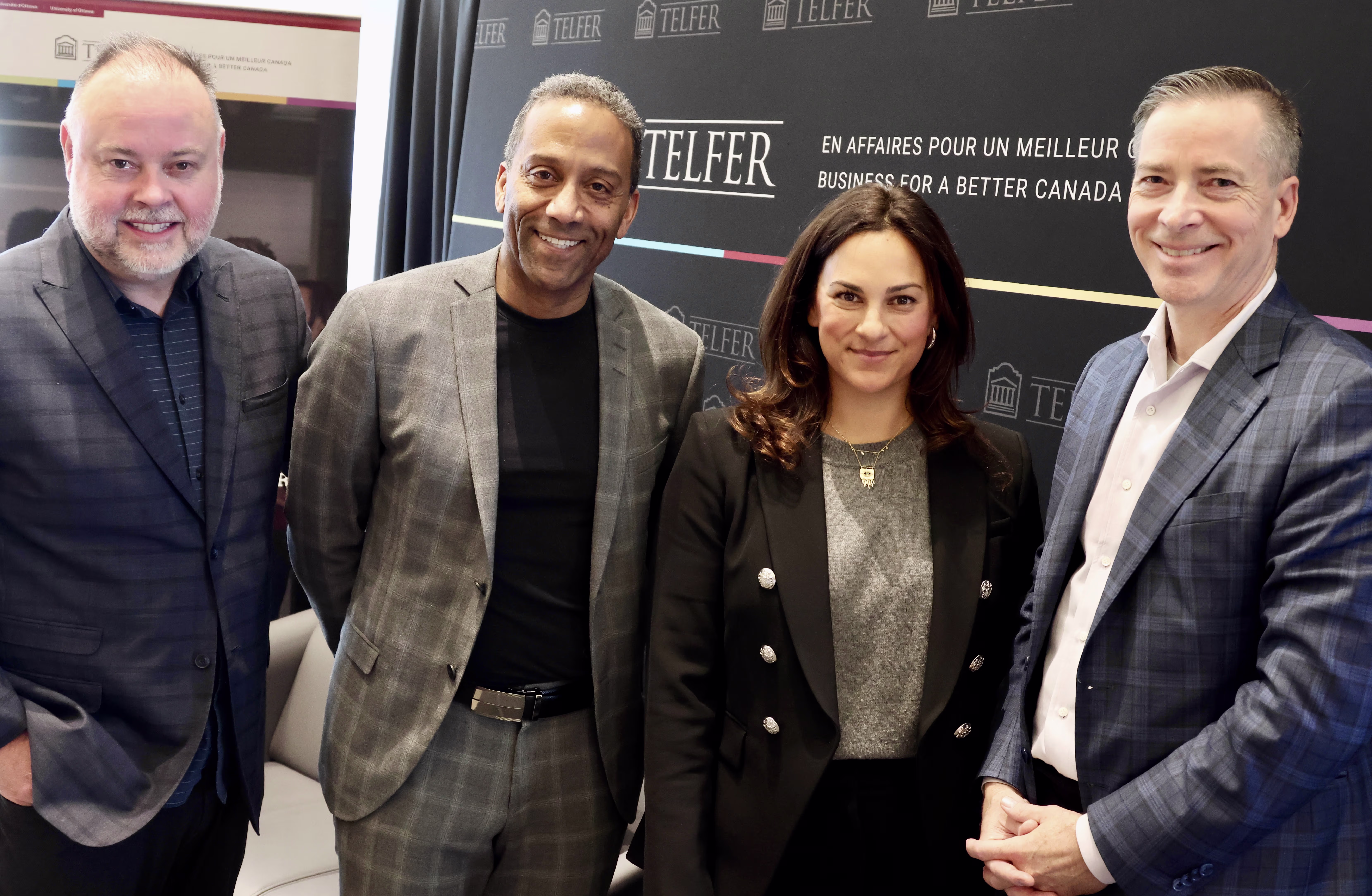 From left, Michael Curran, Dean Brutus, Leslie Feldman and Andrew Waitman standing together for a picture.