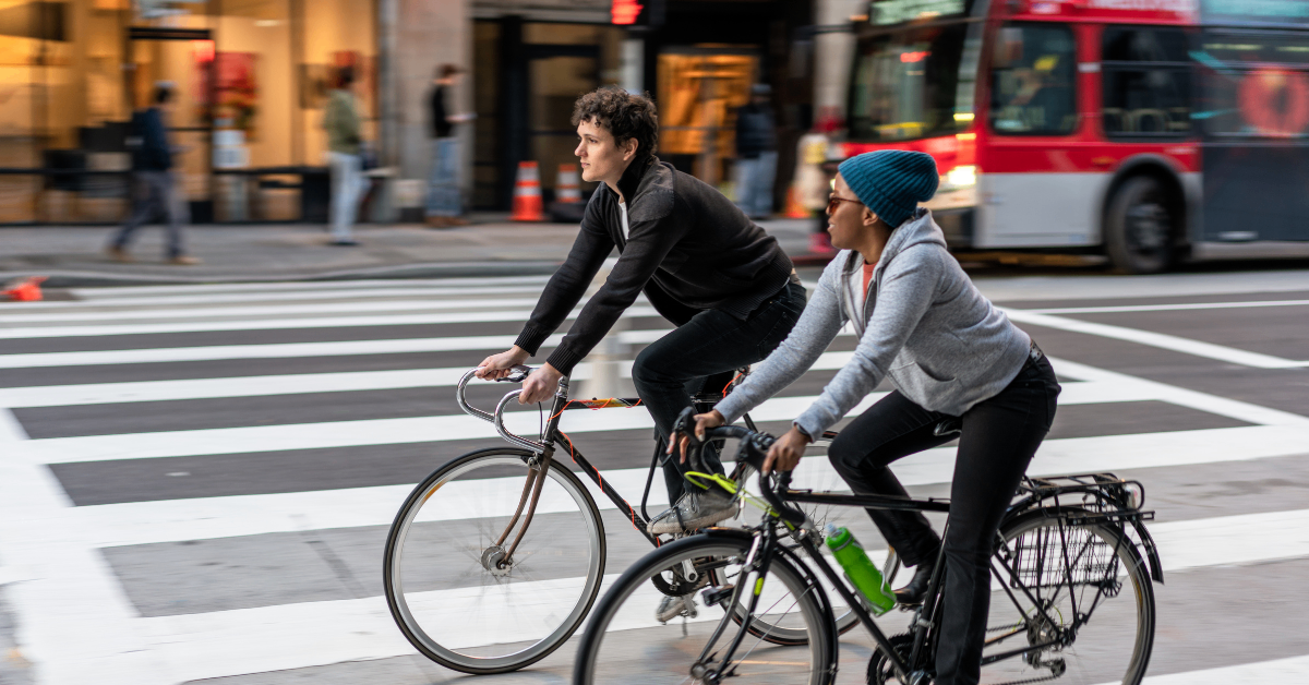 cyclists on a busy street