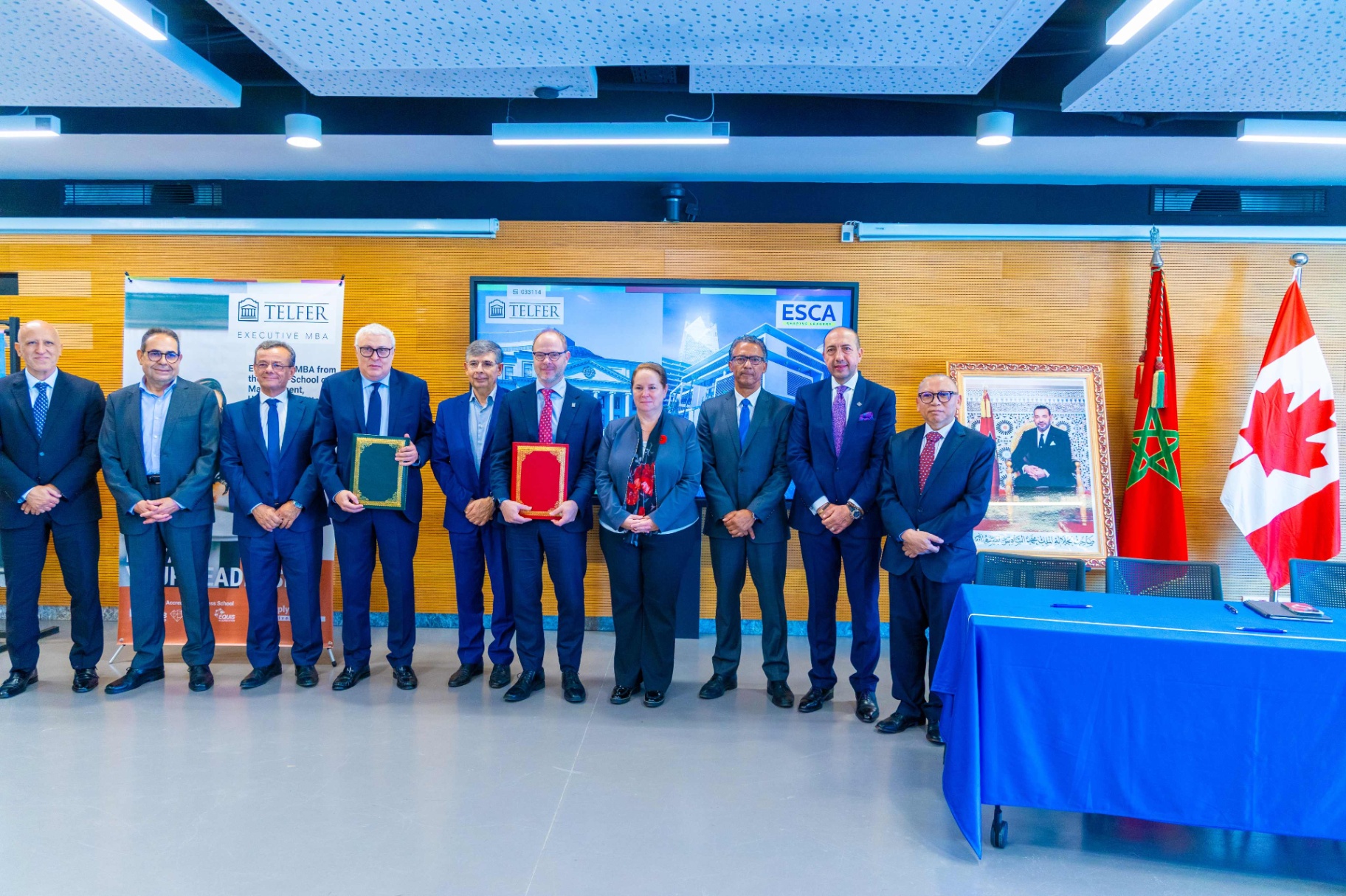 Representatives from the University of Ottawa&rsquo;s Telfer School of Management and ESCA &Eacute;cole de Management stand together during the official partnership signing ceremony in Casablanca