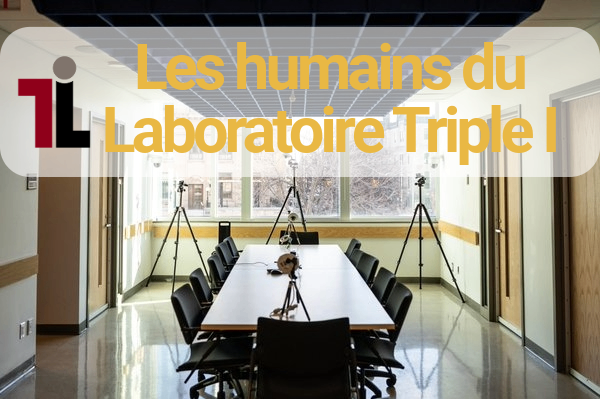 Une salle de réunion avec une table et douze chaises. Un grand texte jaune indiquant « Les humains du Laboratoire Triple I » apparaît en haut, au centre, et le logo du laboratoire Triple I se trouve à gauche du texte.
