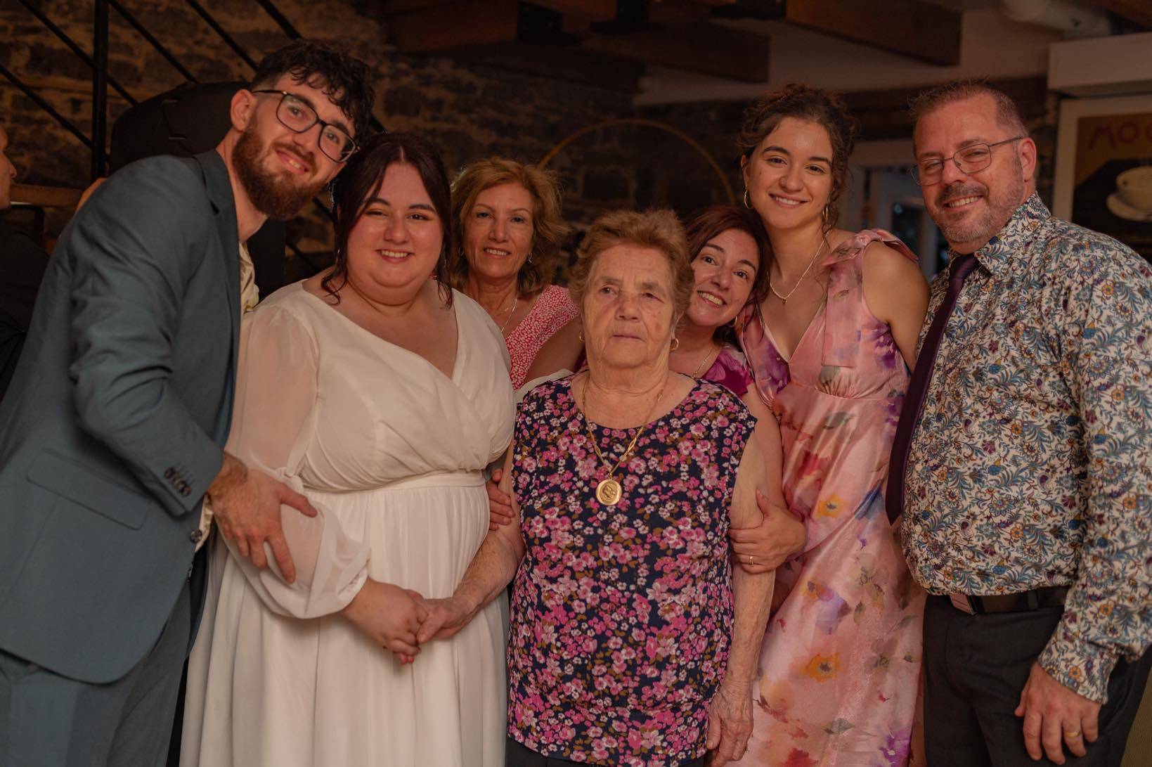 Amanda Maria Kutenski, valedictorian and Master of Science in Health Systems graduate, posing with family members who supported her throughout her graduate studies