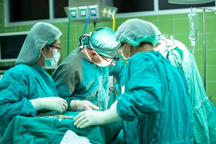 Healthcare professional operation on a patient