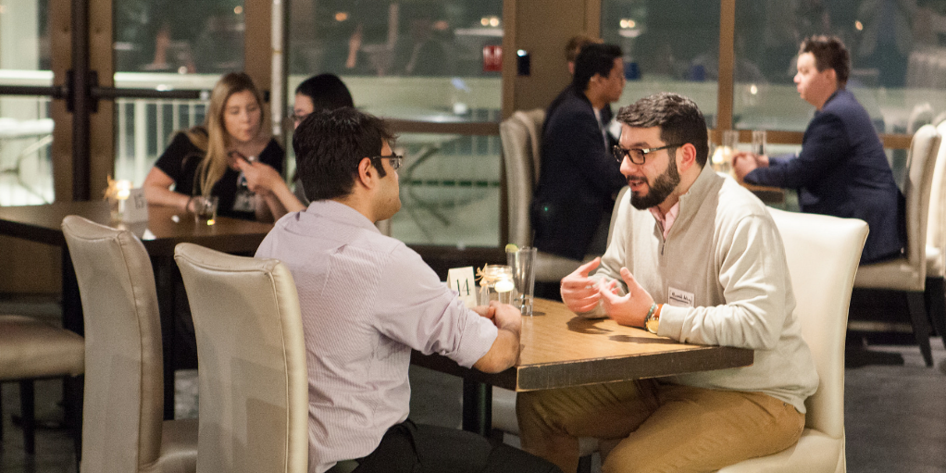 2 person sitting at a restaurant table