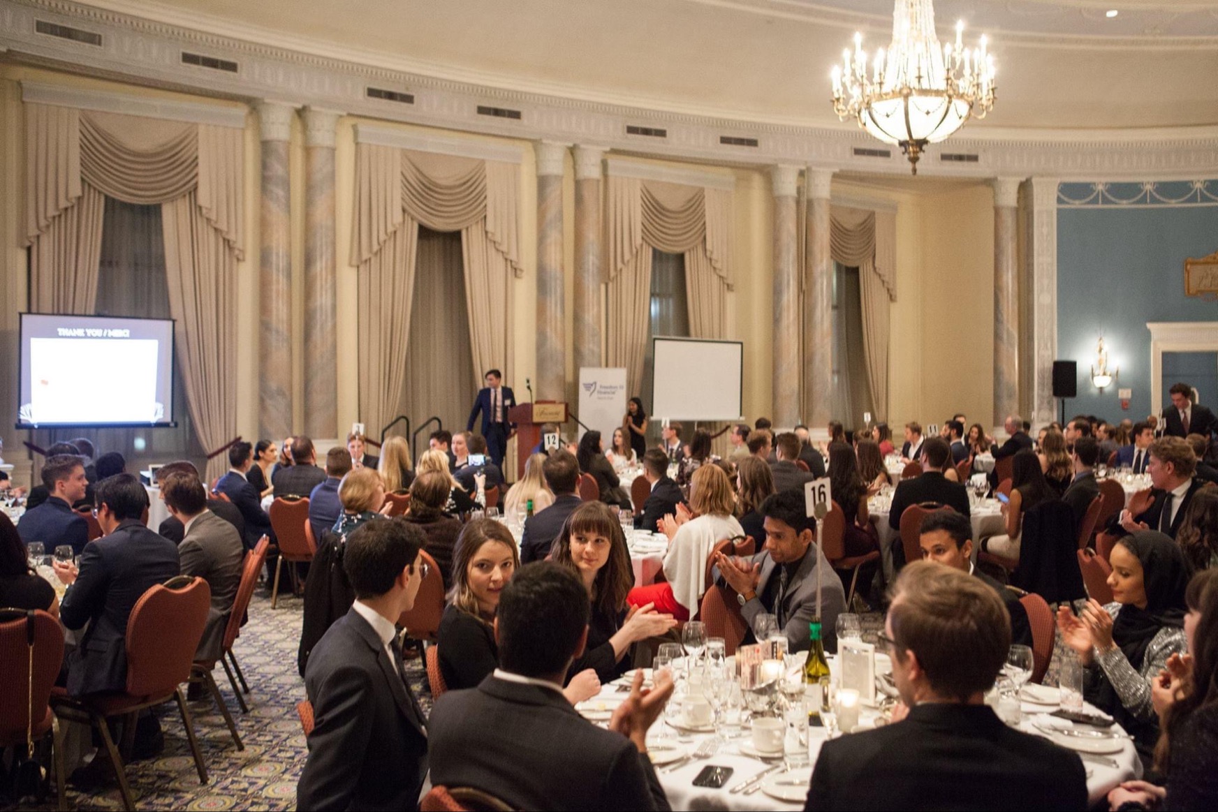 Attendees interacting at the TECDE Business Dinner.