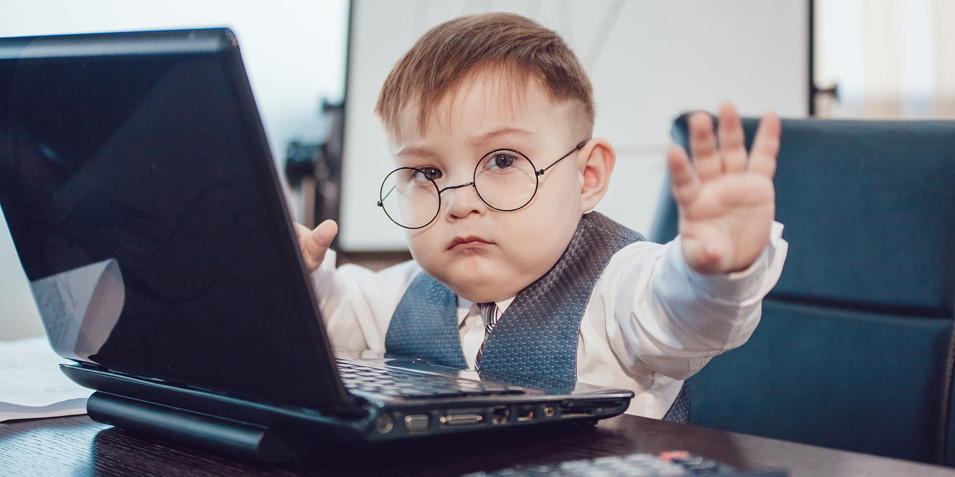 Baby boy working on computer