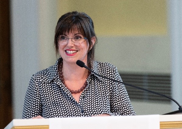 Carole Breton, Telfer Executive MBA Graduate 2021 speaking confidently at work
