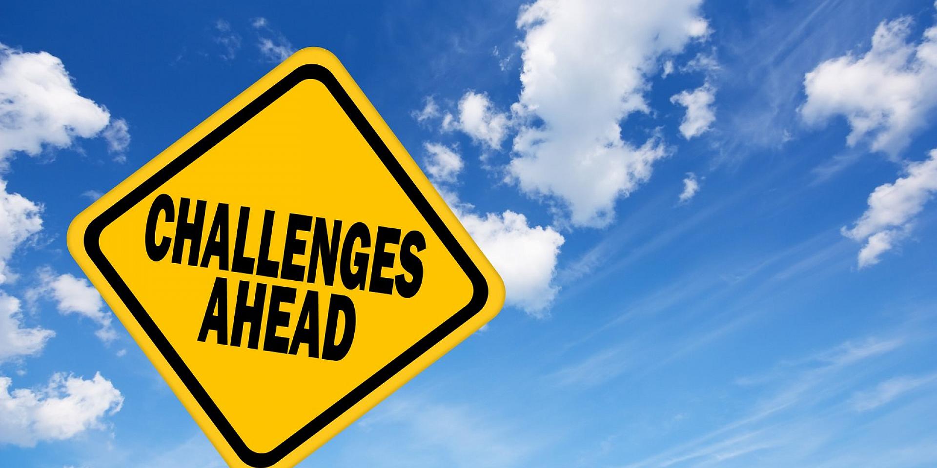Challenges ahead sign