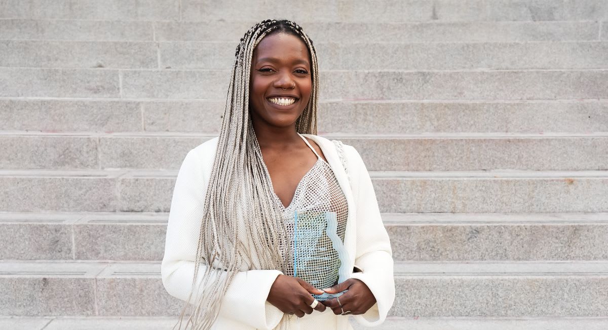 Chizoba Martin holding her award