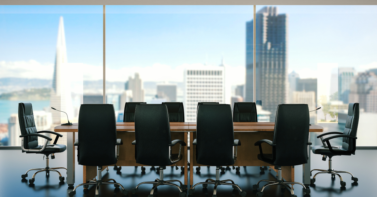 Empty board table looking out to city