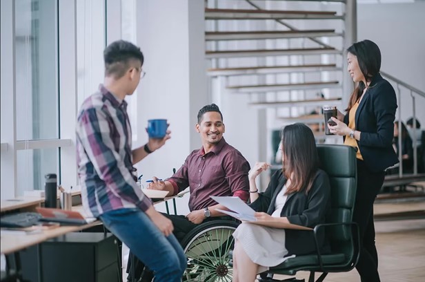 Four people in an office