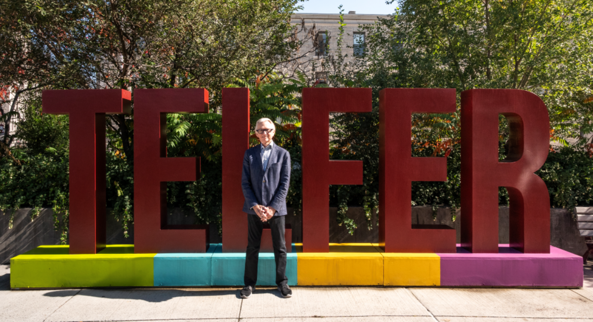 Ian Telfer in front of the Telfer sign