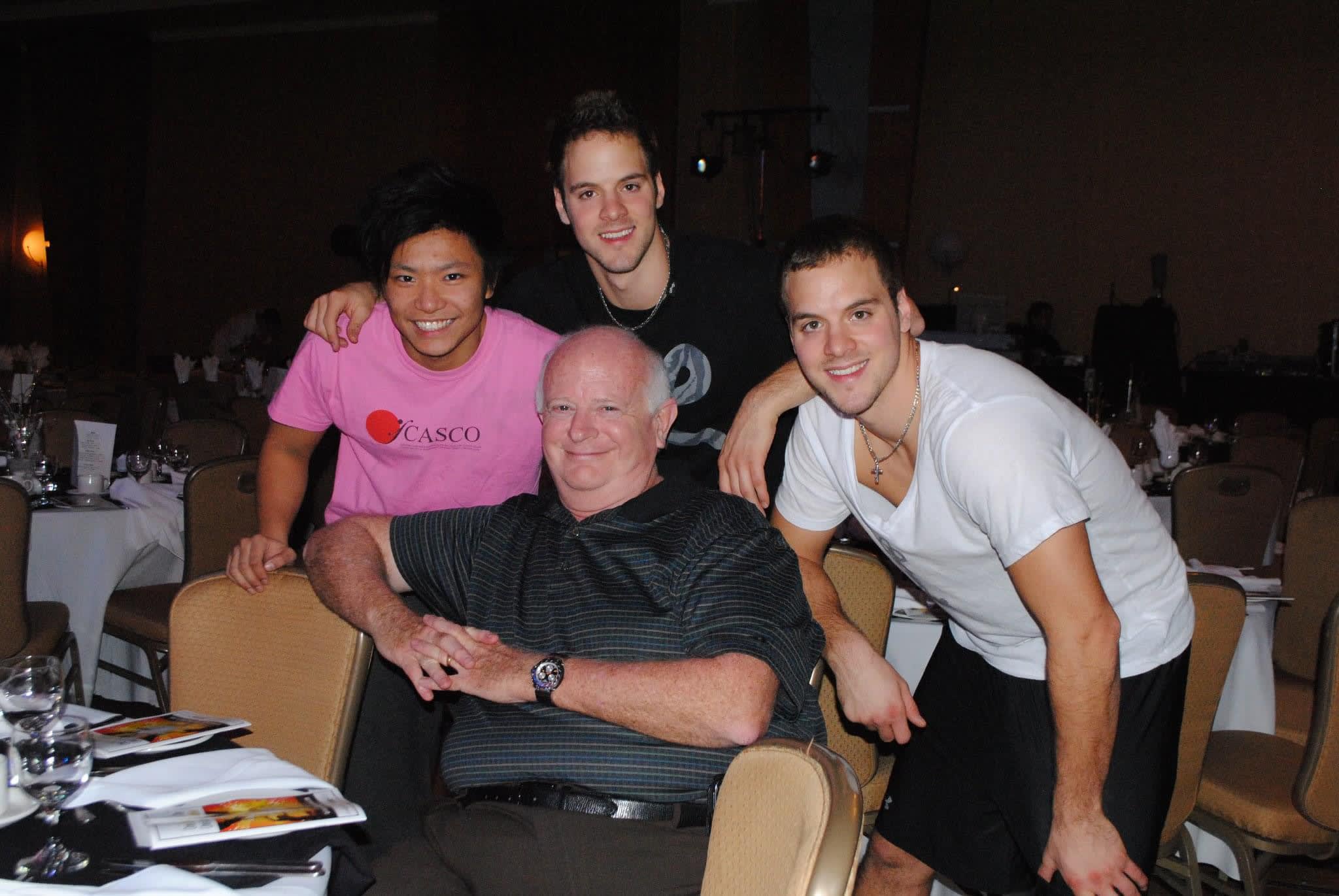 Micheal and Chris Weatherhead, and others, captured in a cheerful group photo.