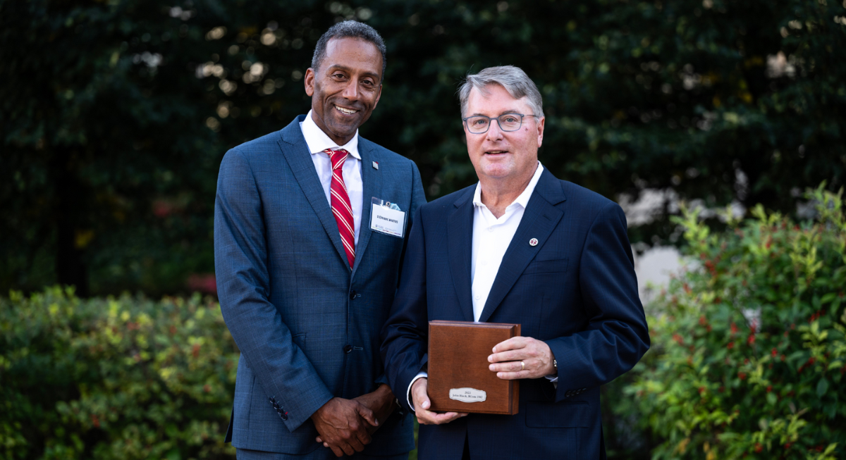 John Black poses with Dean Stéphane Brutus as he receives the R. Trudeau Medal.