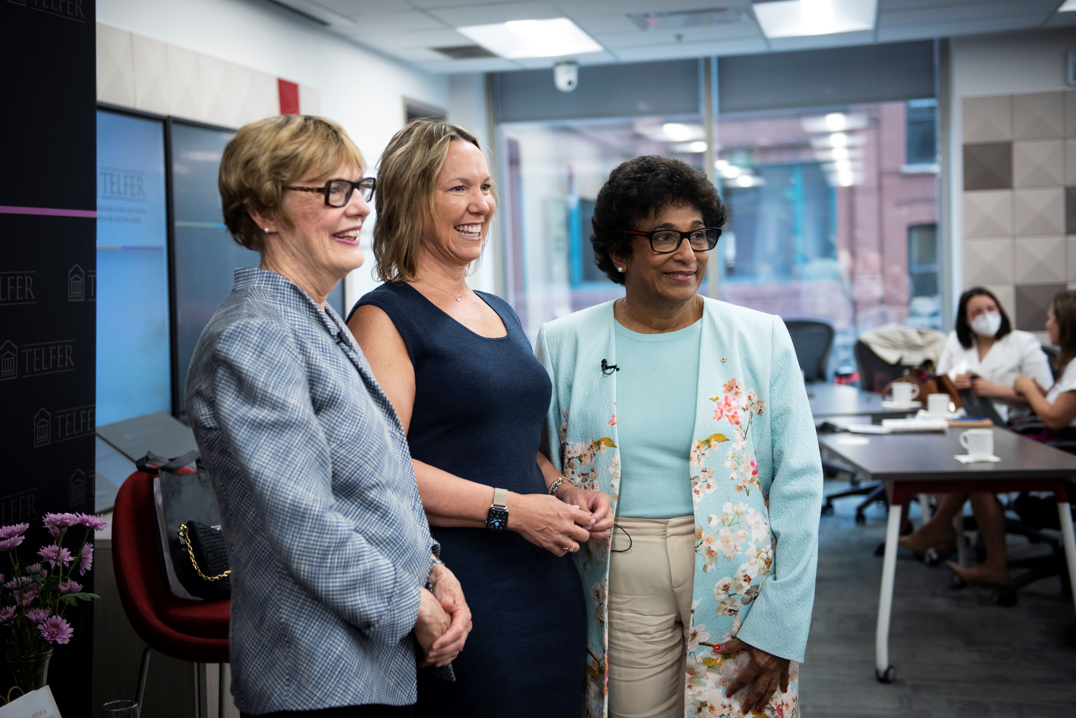 Kathryn Tremblay posing with Martha Piper and Indira Samarasekera at the Centre for Executive Leadership