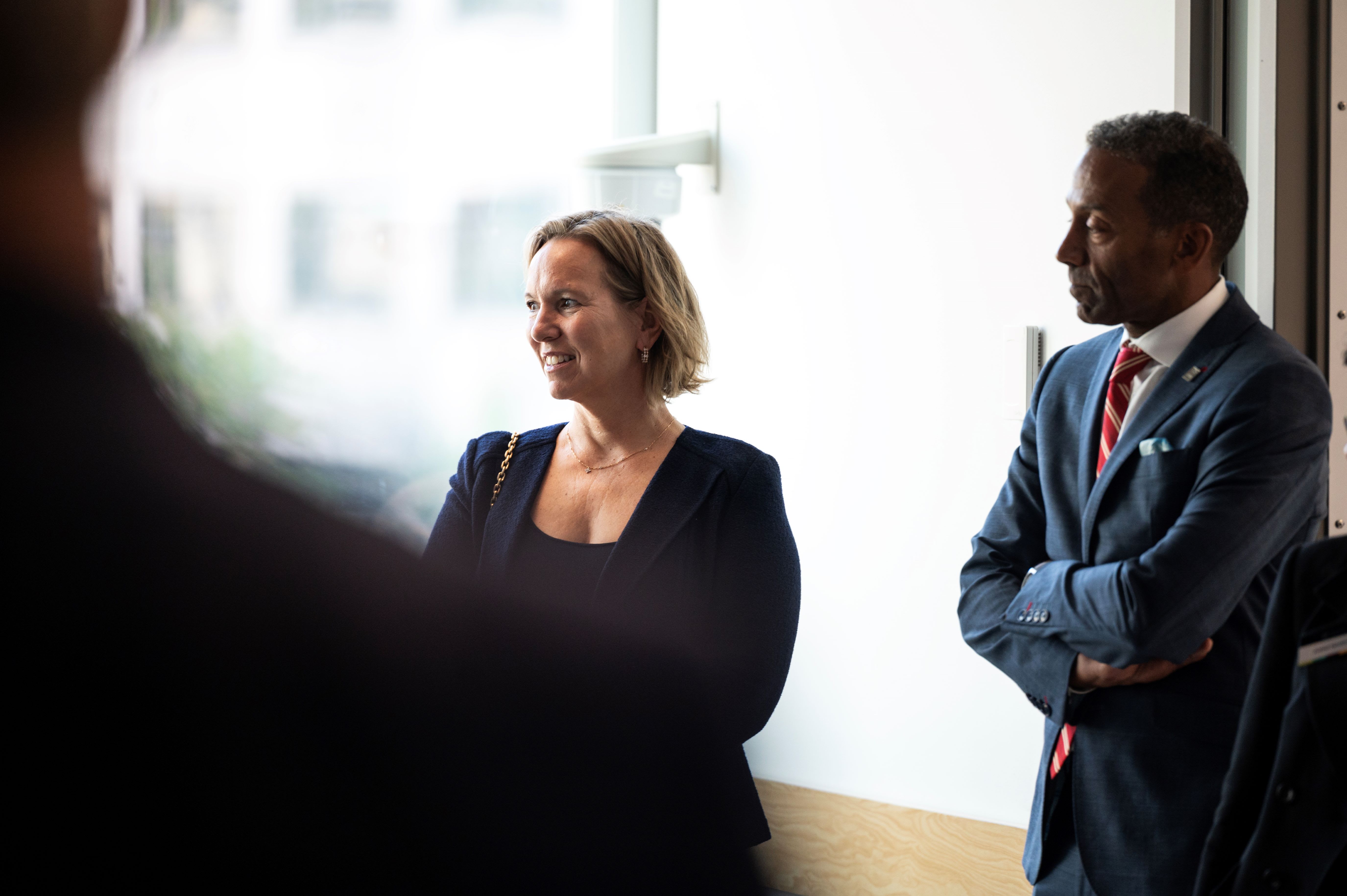 Kathryn Tremblay and Dean Stéphane Brutus standing at an event