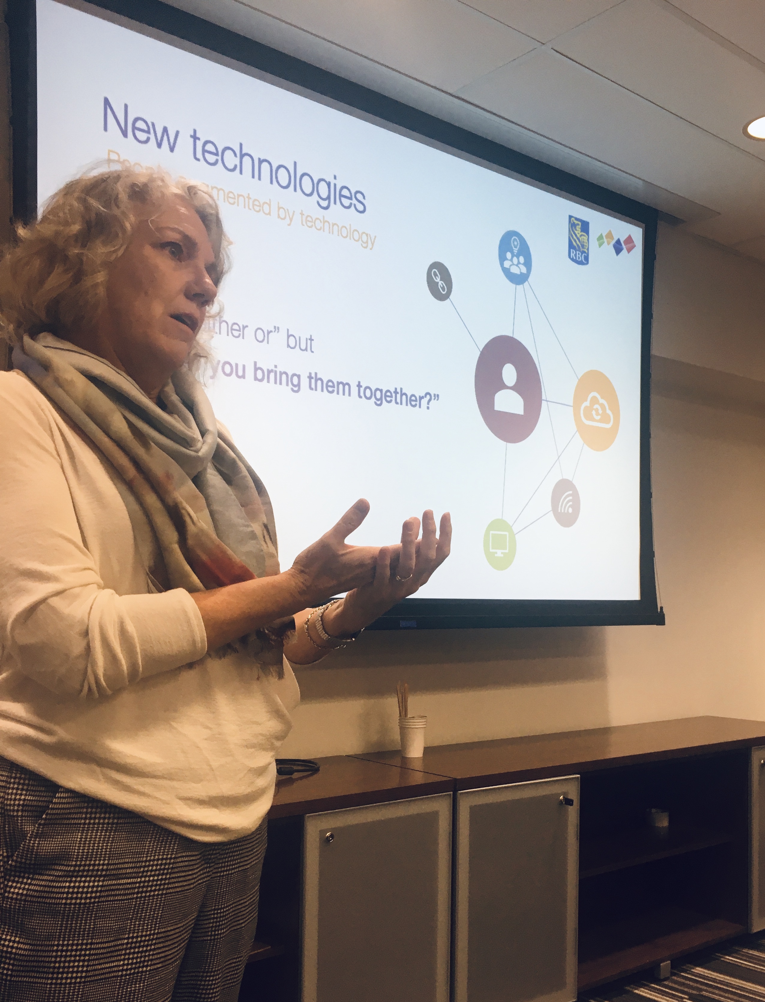Margo presenting at a conference