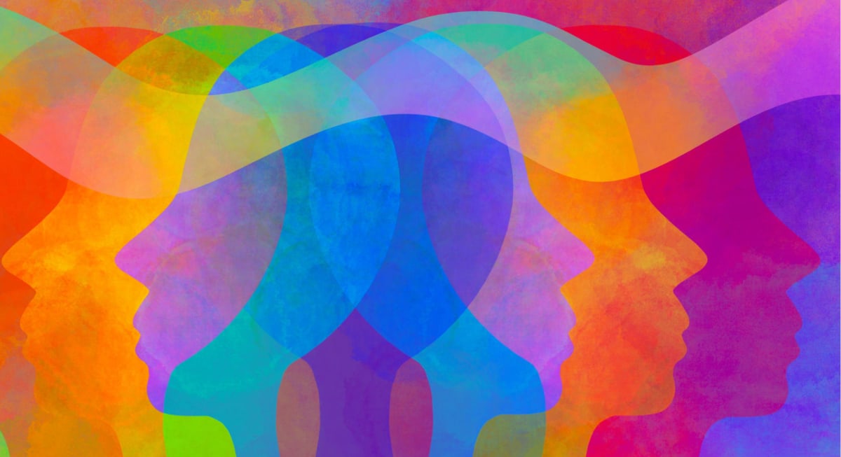 Multiple colorful silhouettes of faces
