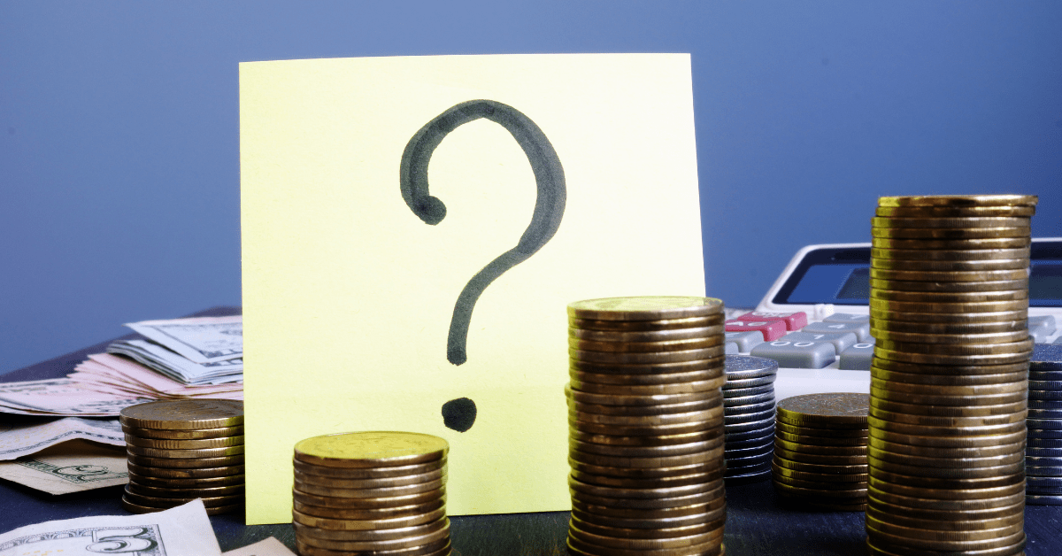 stacked coins with question mark