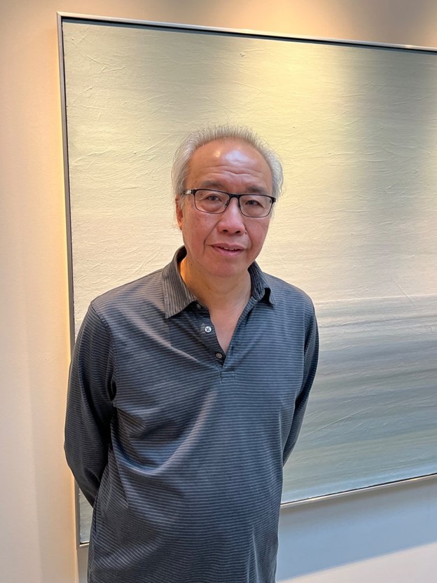 Raymond Heung smiling