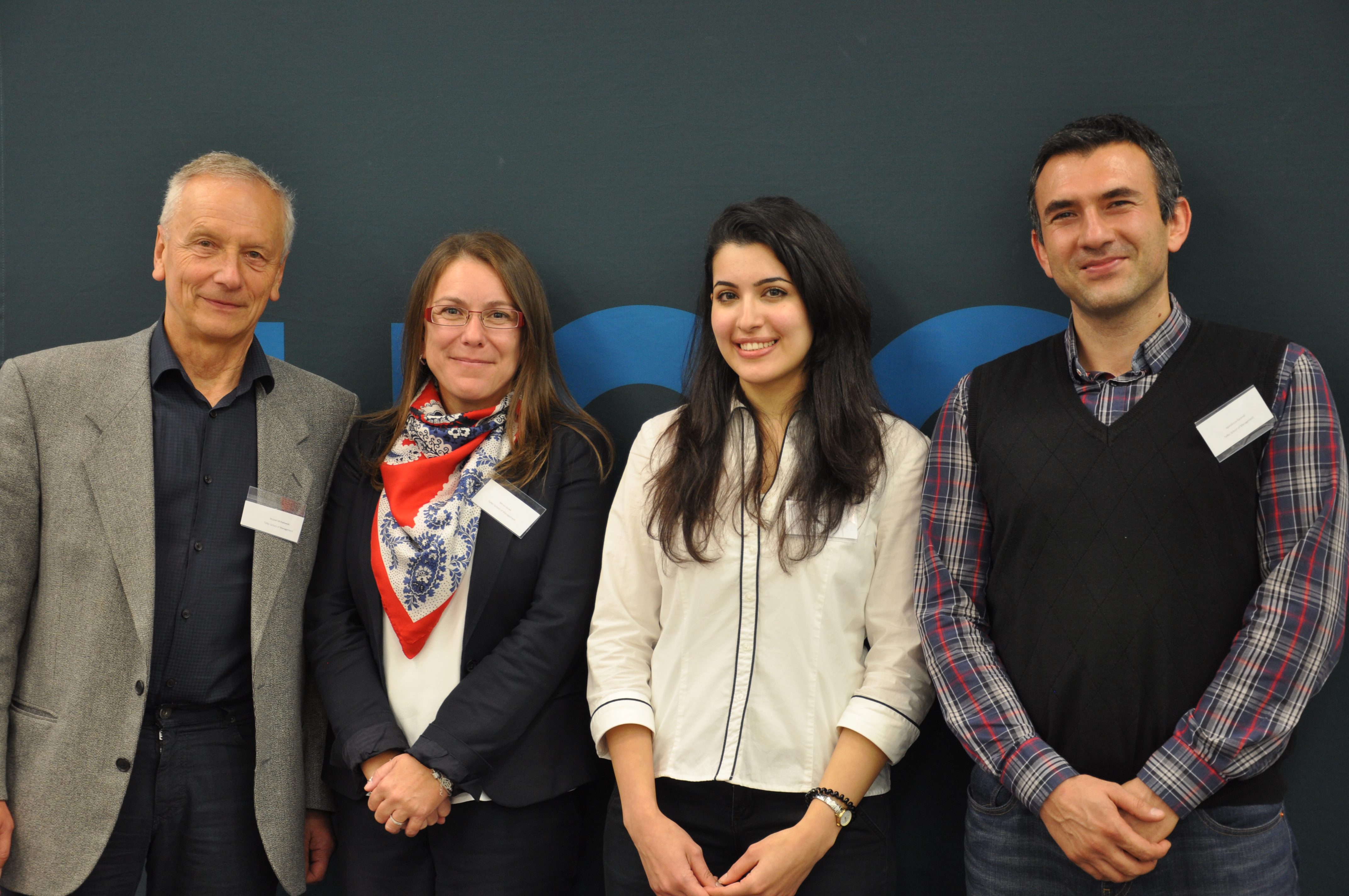 Students representing the Telfer School, Vice Dean of Research, and PhD program director