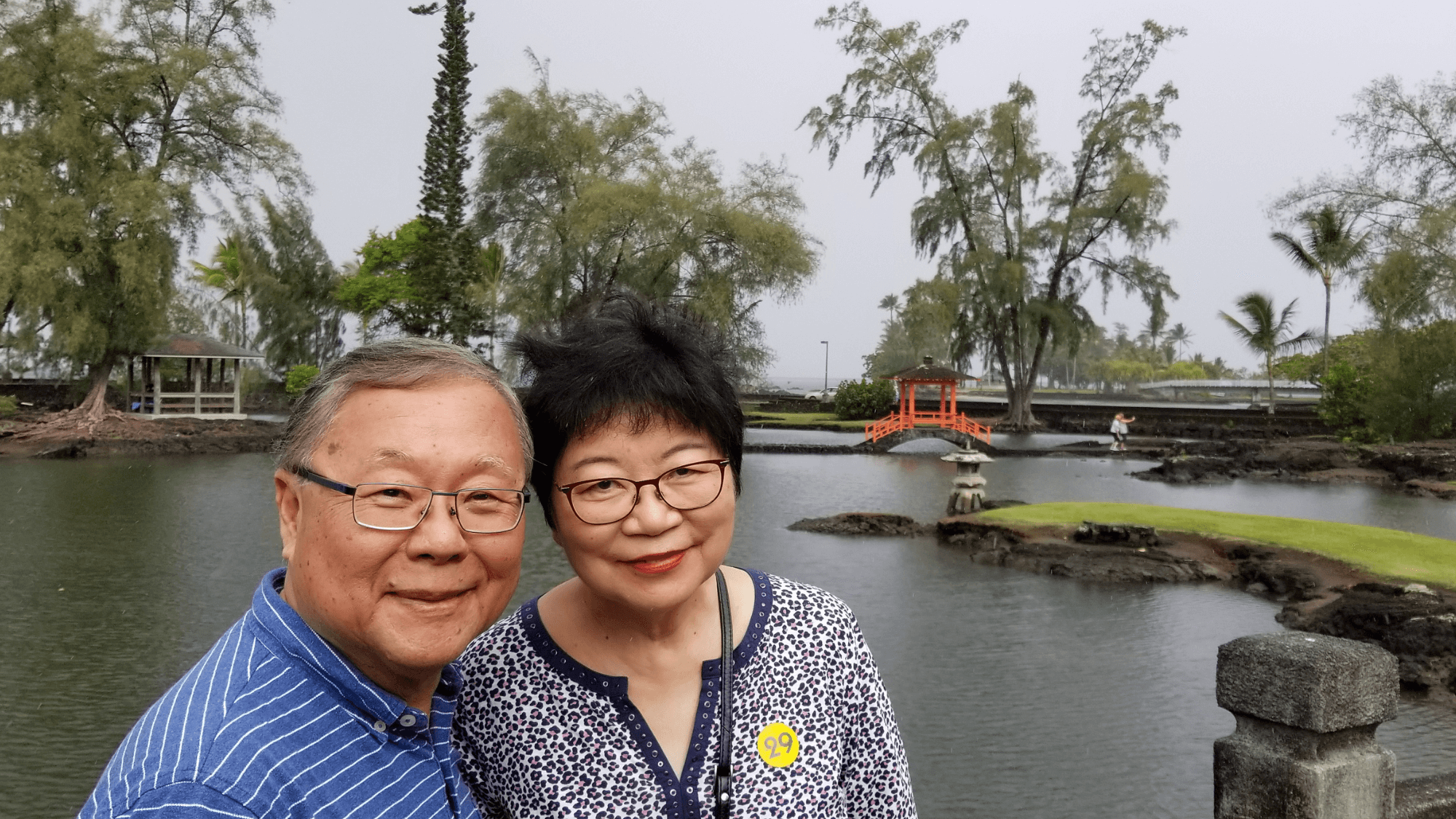 Swee and Lilian Goh taking a picture outdoor