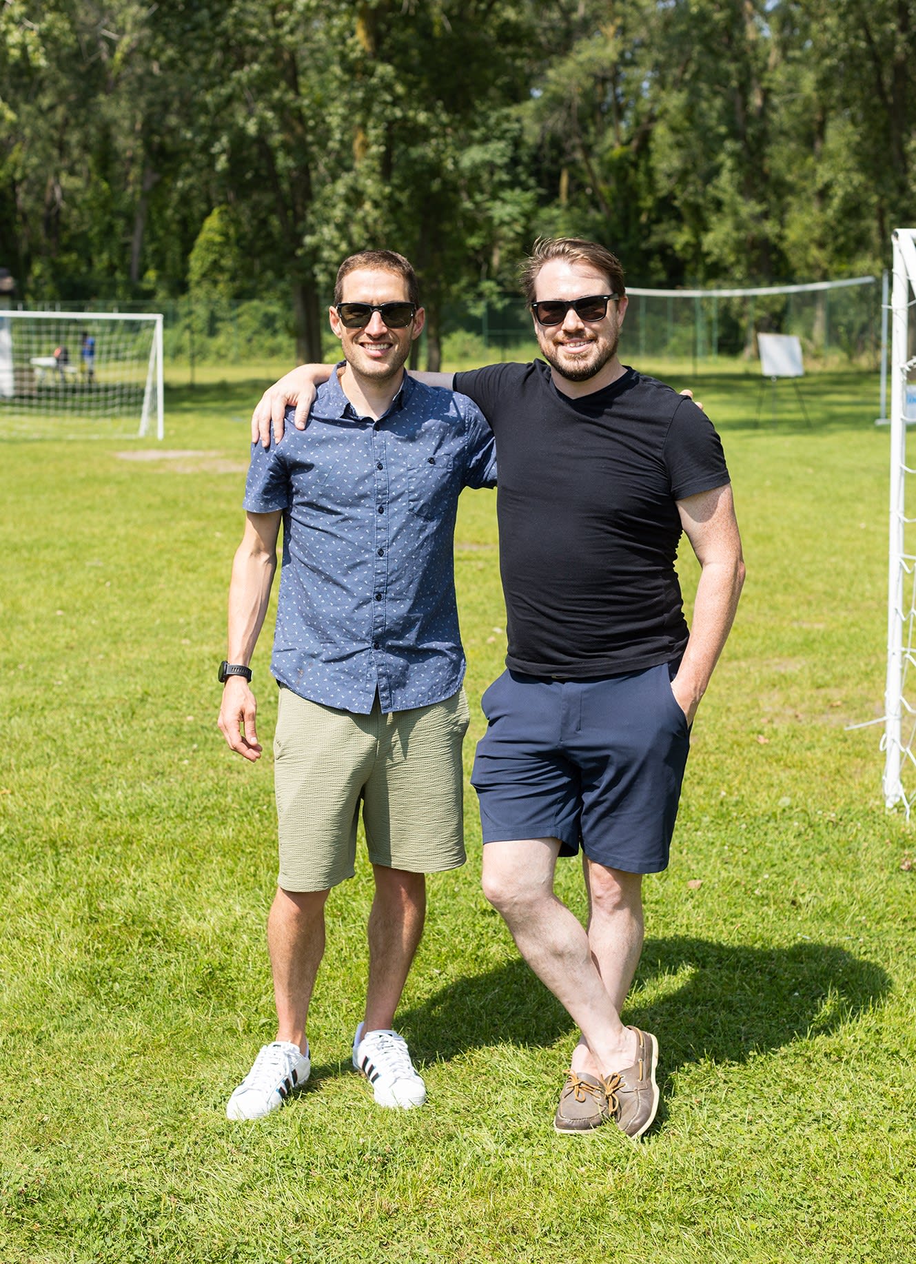 Todd Shannon and Gareth Musico posing for a photo at a park.