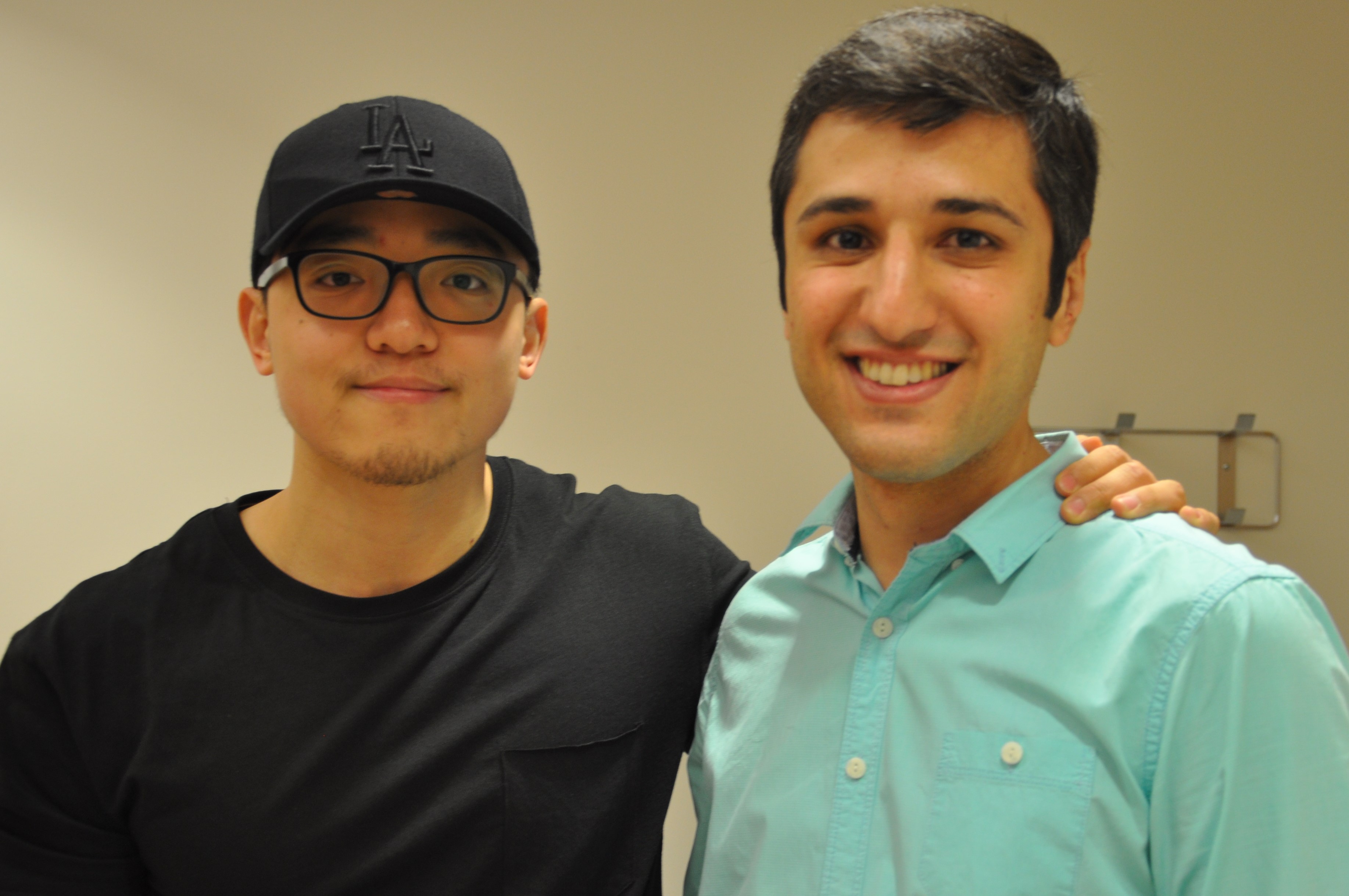 Two students pose for a photo