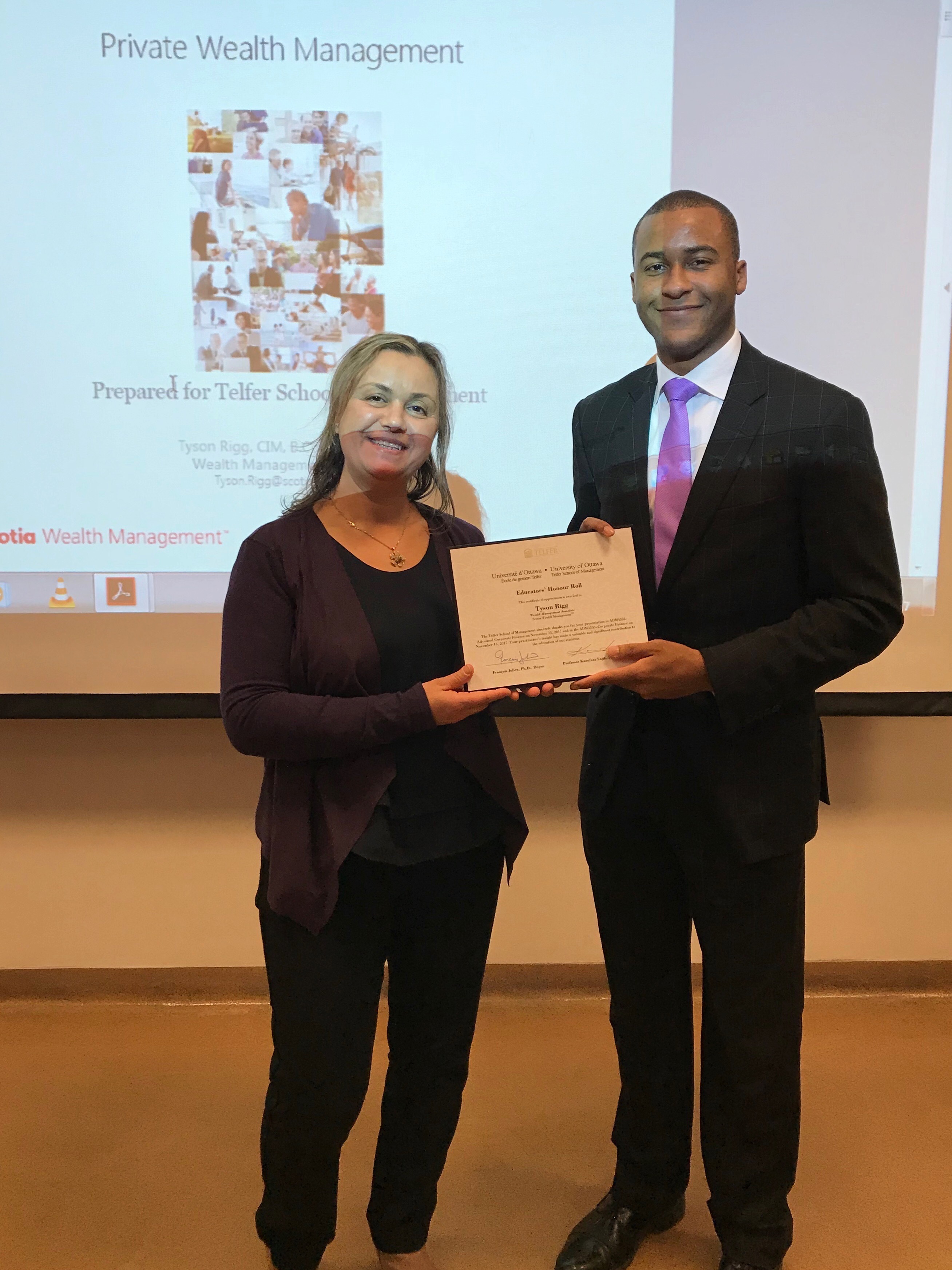 Tyson Rigg with a professor