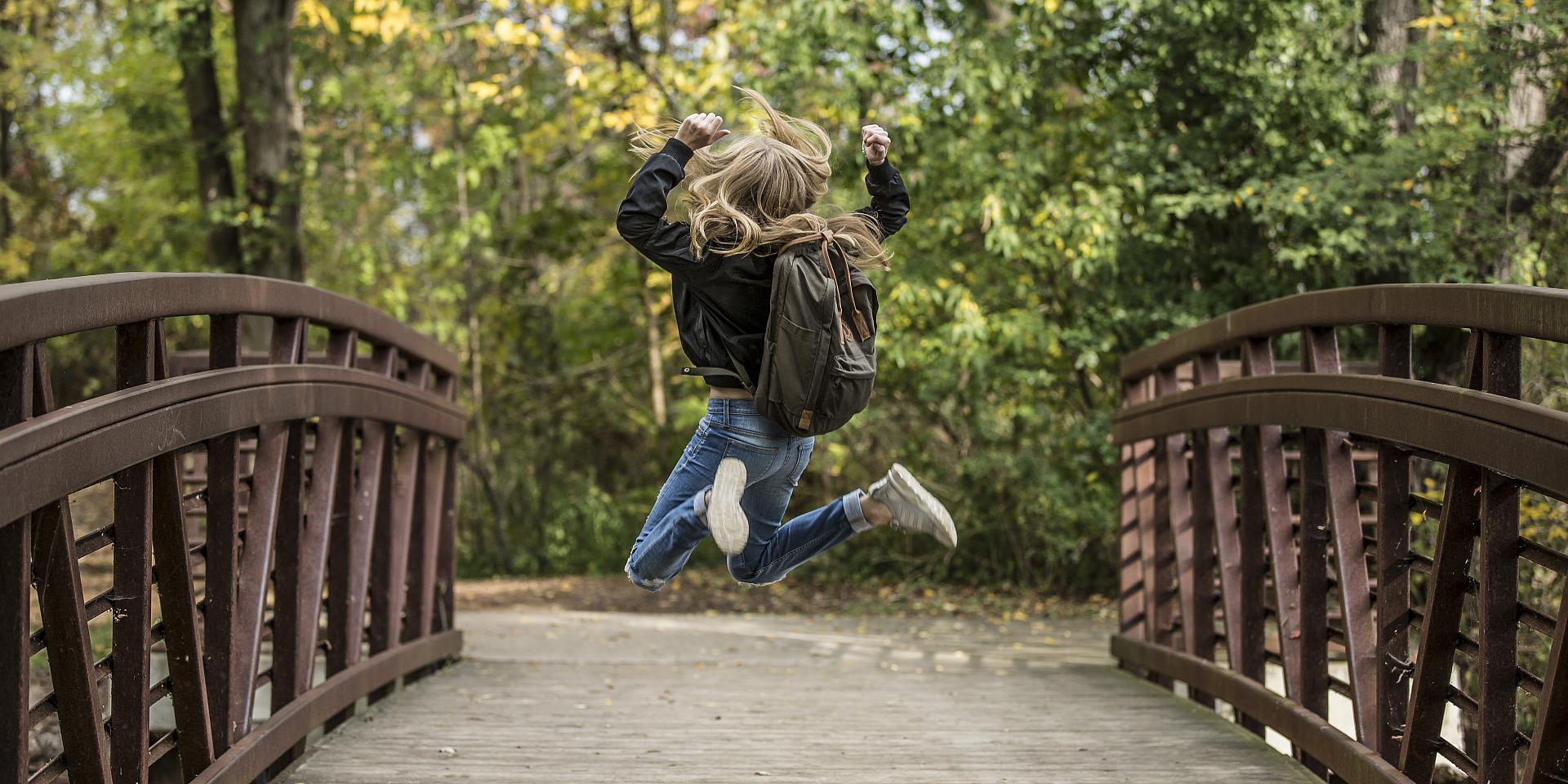 Woman jumping in the air