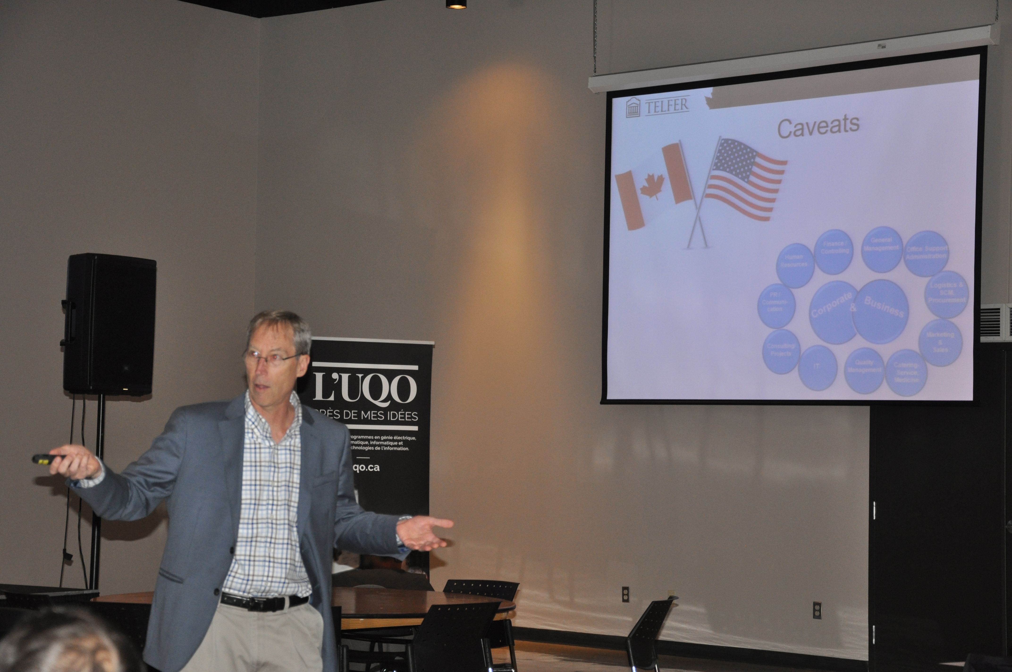 Visiting Professor James Combs gives a presentation